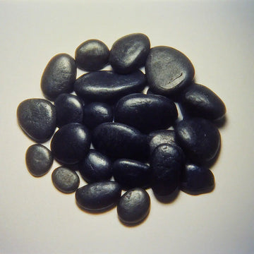 What Are the Benefits of Using Black River Rock Over Other Types of Pebbles?